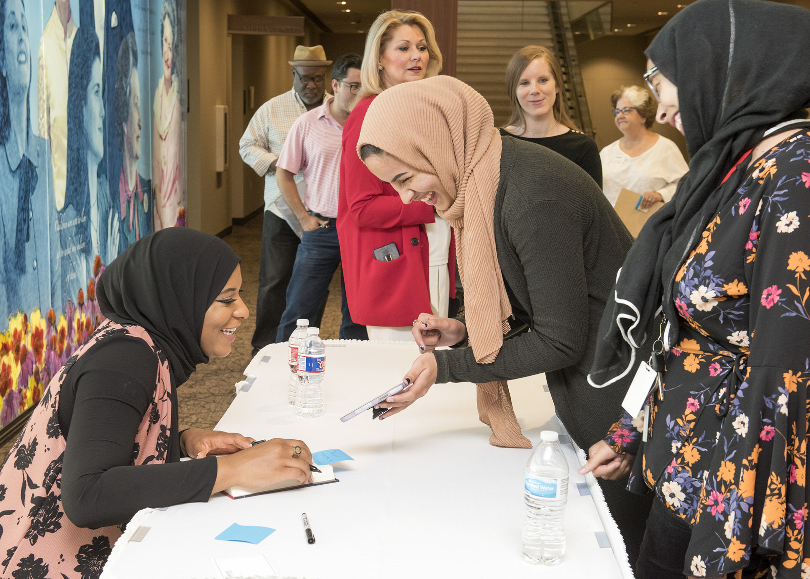 Ibtihaj Muhammad signs her book at the LBJ Library